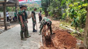 Kapendam Jaya : Salah Satu Konstribusi TMMD Kodim 0509/Kab Bekasi Sepanjang 210 Meter Jalan Desa Ciloa Tuntas Di Cor